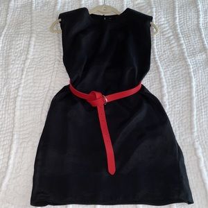 Silk dress, black. Shoulder pads. Never worn. New with tags.